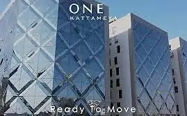 One Katamya — faceted glass curtain-wall elevation