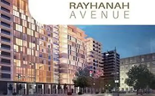 Rayhana Avenue — mixed-use avenue development at dusk