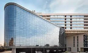 Crystal Plaza — curved glass-clad commercial building
