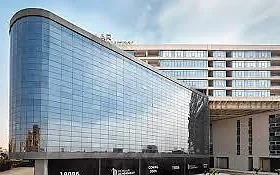 Crystal Plaza — curved glass-clad commercial building
