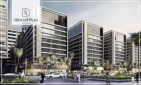 Degla Landmark — mid-rise development with horizontal banding and street-level frontage